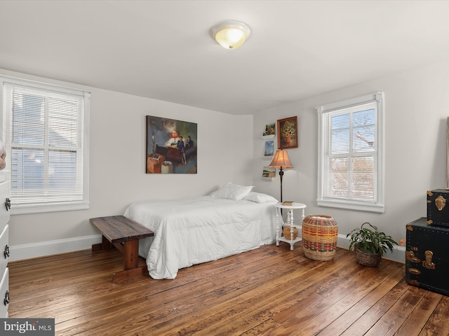 bedroom featuring dark wood-type flooring