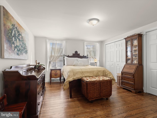 bedroom featuring dark wood-type flooring