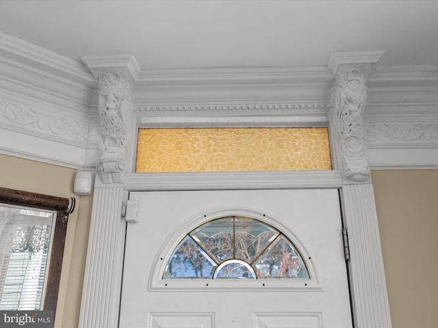 details featuring crown molding