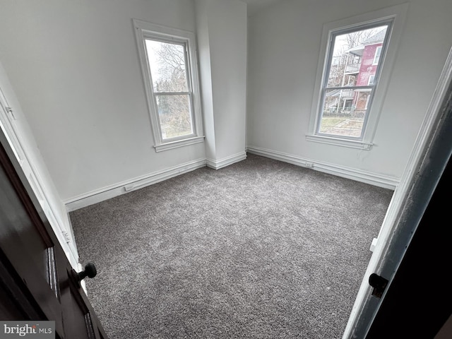 unfurnished room featuring carpet floors