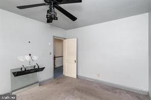 interior space featuring ceiling fan