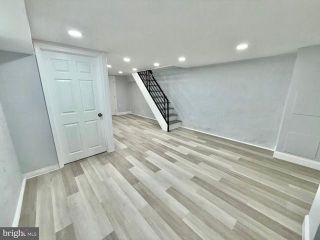 basement with light wood-type flooring