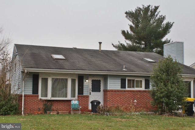 view of front of house with a front yard