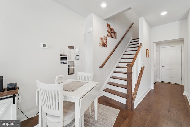 dining room featuring dark hardwood / wood-style flooring