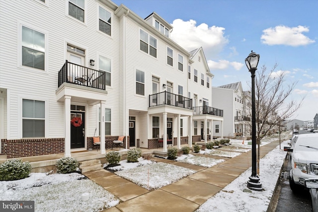 view of snow covered property