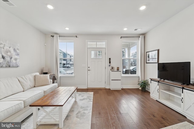 living room featuring dark hardwood / wood-style flooring