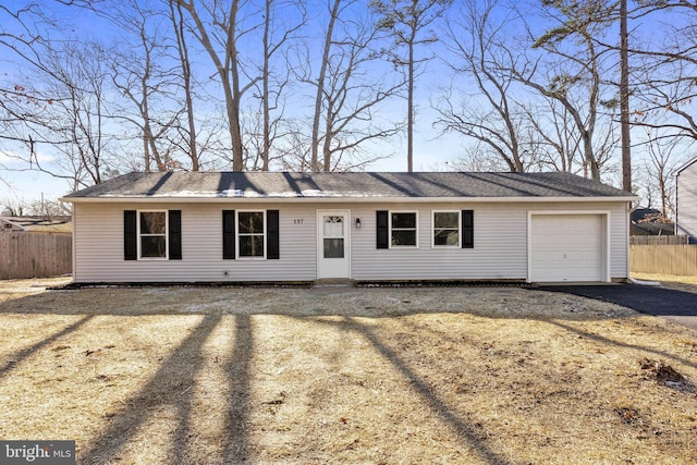 ranch-style house featuring a garage