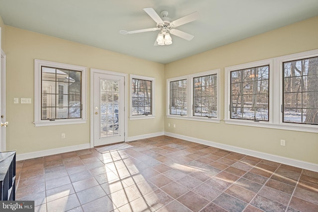 unfurnished room with ceiling fan