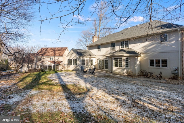 back of house featuring a patio