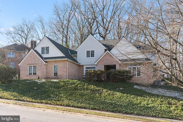 front facade with a front lawn