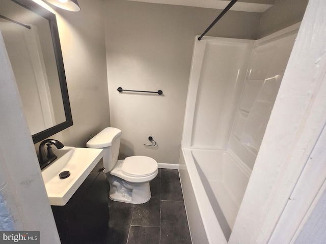 bathroom with tile patterned floors, vanity, and toilet