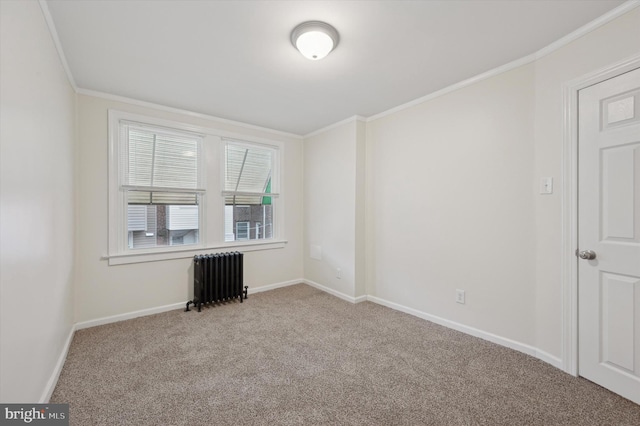 spare room with light carpet, radiator heating unit, and crown molding