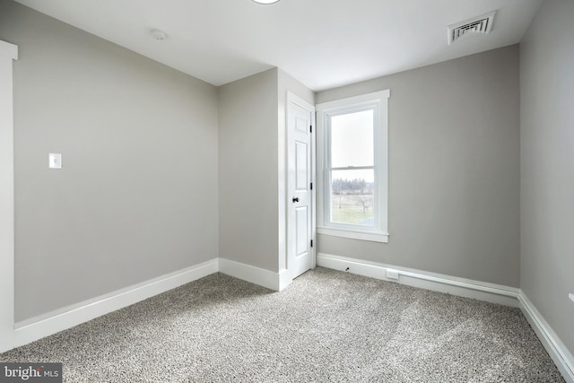 view of carpeted spare room