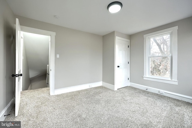 unfurnished bedroom with carpet floors