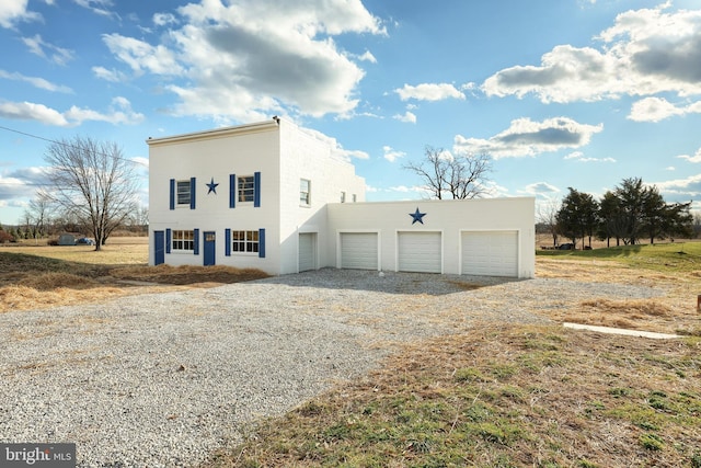 exterior space with a garage