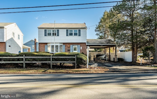 view of front of house with a carport