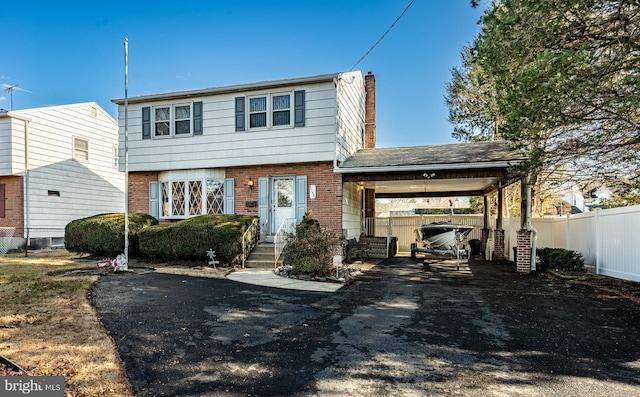 view of front of house featuring a carport