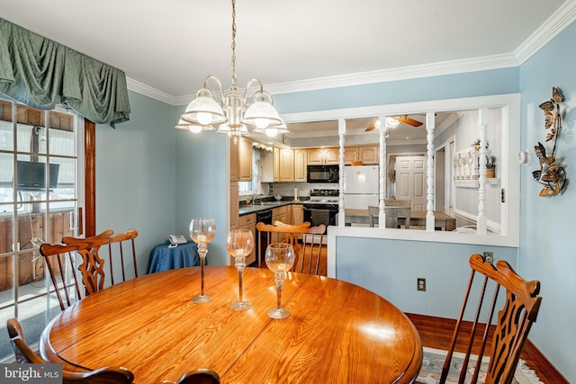 dining room with a notable chandelier, light hardwood / wood-style floors, sink, and crown molding