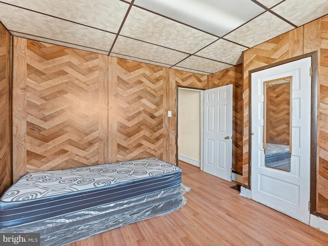 unfurnished bedroom with hardwood / wood-style floors