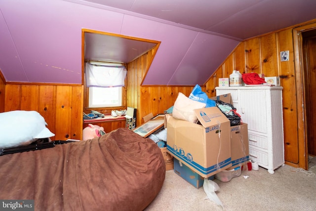 additional living space featuring light colored carpet and lofted ceiling