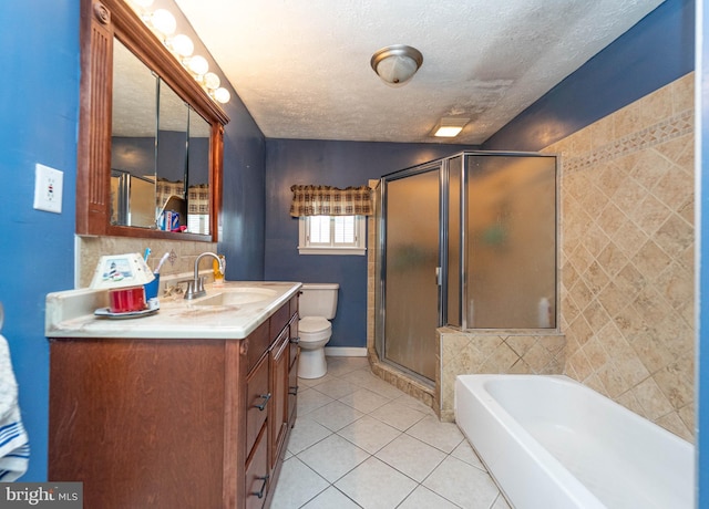 full bathroom with tile patterned floors, a textured ceiling, shower with separate bathtub, toilet, and vanity