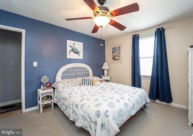 carpeted bedroom featuring ceiling fan