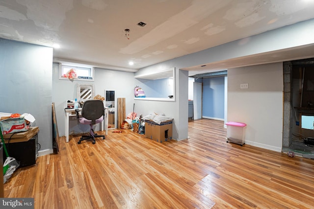 home office featuring light hardwood / wood-style flooring