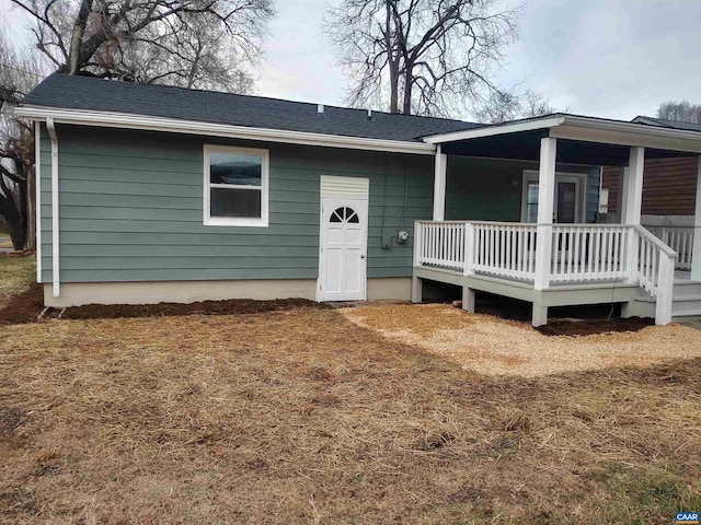 view of front of home with a wooden deck