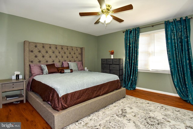 bedroom featuring ceiling fan and hardwood / wood-style floors