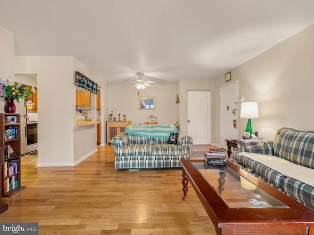 bedroom featuring ceiling fan and light hardwood / wood-style floors