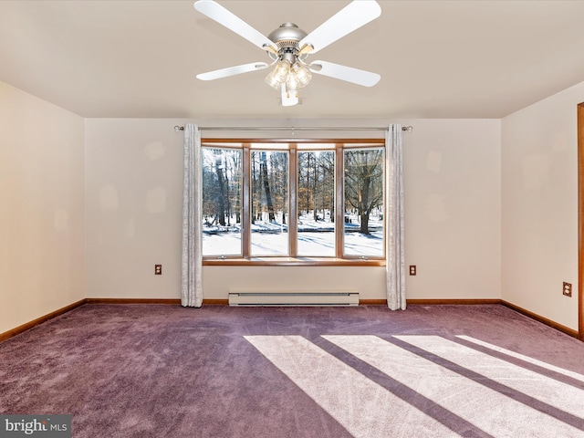 carpeted spare room with baseboard heating and ceiling fan