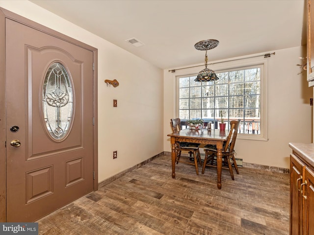 dining room featuring hardwood / wood-style floors