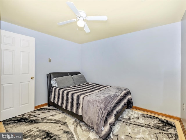 bedroom featuring ceiling fan