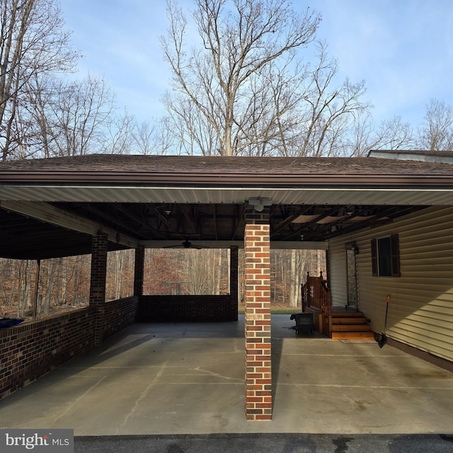 view of parking with ceiling fan and a carport