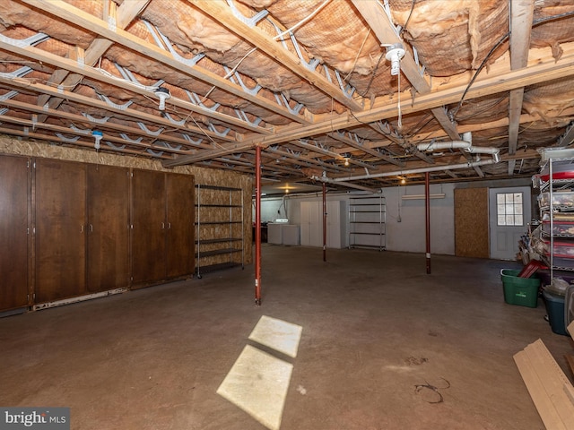 basement featuring washer and dryer