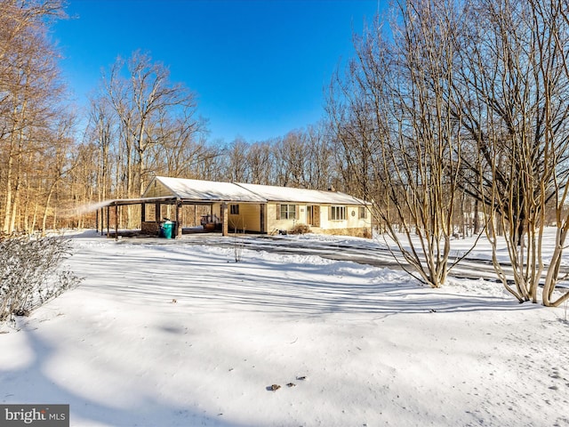 view of snow covered property