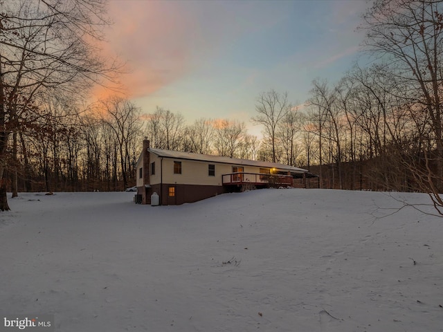 exterior space with a wooden deck