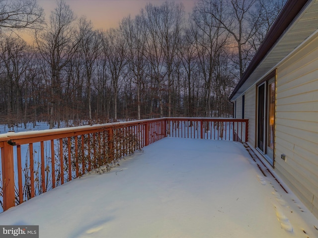 view of snow covered deck