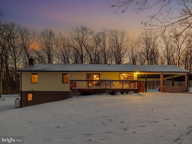 view of front of property featuring a wooden deck