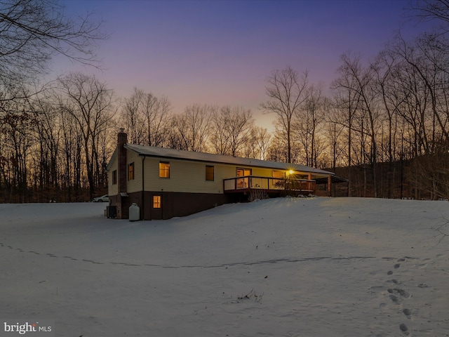 exterior space featuring a deck and central air condition unit