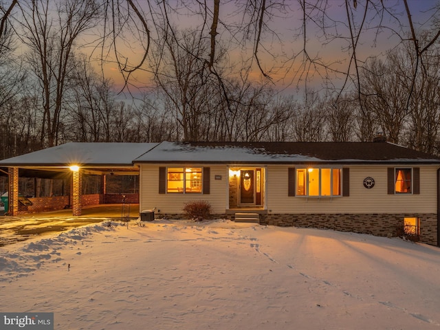 view of front of house with a carport