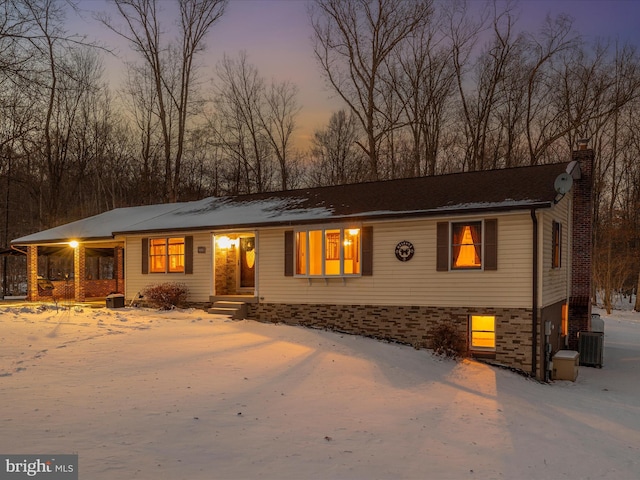 view of front of home with central AC unit