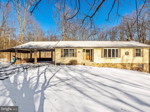 single story home with a carport