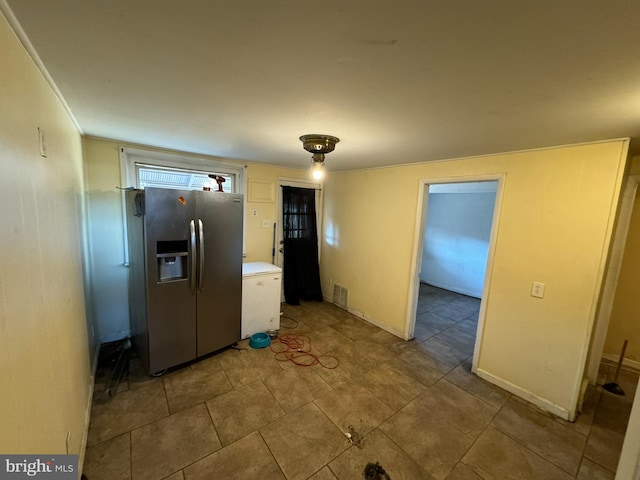 kitchen with stainless steel fridge