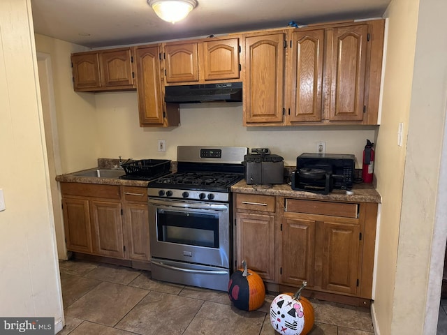 kitchen with sink and gas range