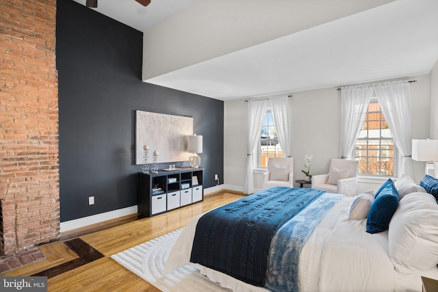 bedroom with light hardwood / wood-style flooring