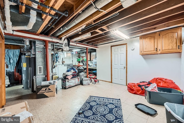 basement featuring water heater