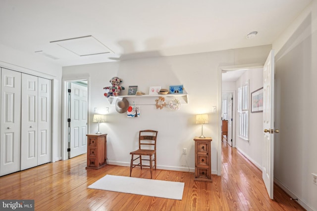 living area with wood-type flooring