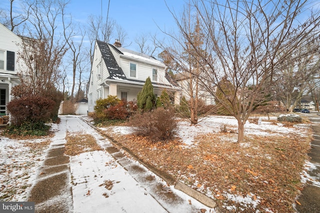 view of snow covered property