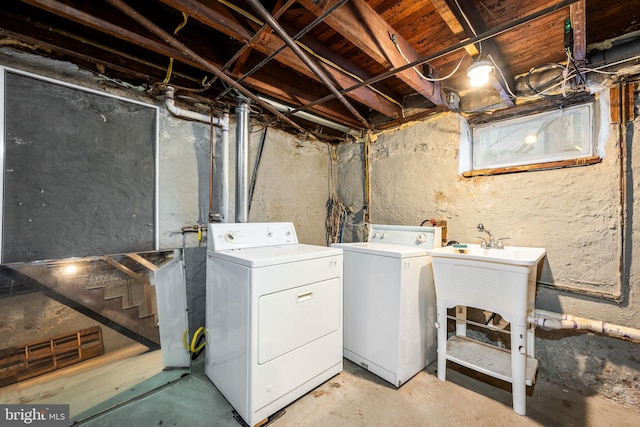 laundry room featuring separate washer and dryer